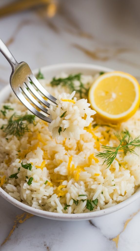 Ultra close-up of a fork fluffing steaming basmati rice, with a warm, slightly golden hue from melted butter, visible flecks of lemon zest, and bright green chopped parsley and dill, with fresh lemon juice just added, on white marble counters with hints of gold, with all-natural lighting, taken with an iPhone 15 Pro, top-down shot used by recipe bloggers.