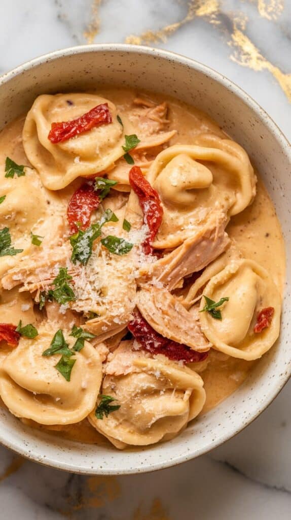 Crockpot Chicken Alfredo Tortellini with Sun-Dried Tomatoes
