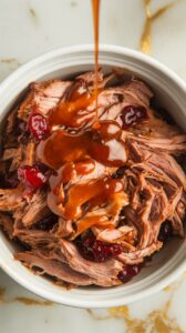 Crockpot Cranberry Chipotle Pulled Pork with Maple Glaze