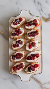 Crostini with Goat Cheese, Dried Cranberries, and Thyme