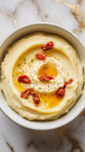 Mashed Potatoes with Goat Cheese and Sun-Dried Tomatoes