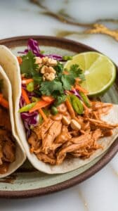 Thai Peanut Crockpot Chicken Tacos