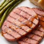 Why this Grilled Honey Bourbon Glazed Ham Steaks works