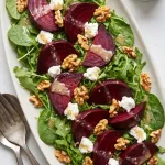 Roasted Beet Salad with Goat Cheese, Walnuts & Honey-Dijon Vinaigrette